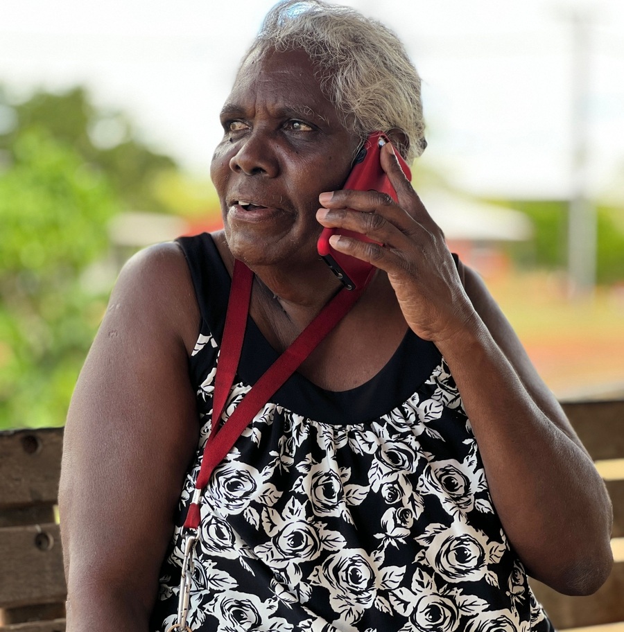 Traditional owner Marrpalawuy Marika on phone in Gäṉgaṉ homeland