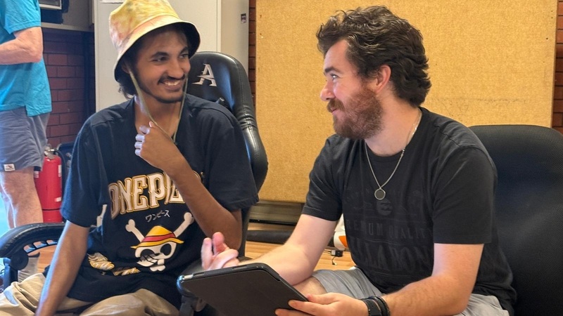 Derby co-researchers Aaron Shadforth and Owen Burns completing surveys