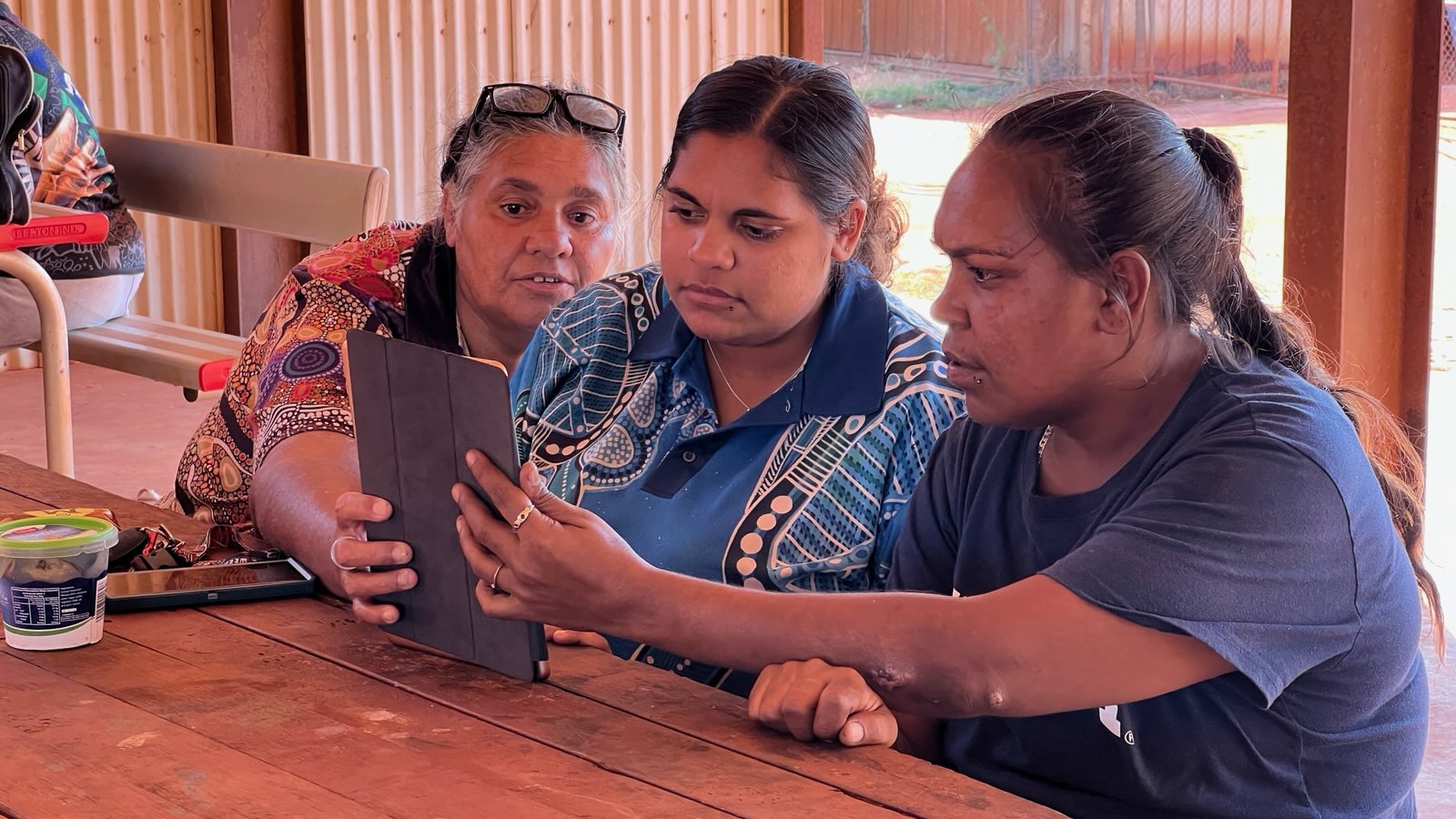 Djarindjin residents Philomena Manado, Samina Manado and Katherine May completing surveys in 2023